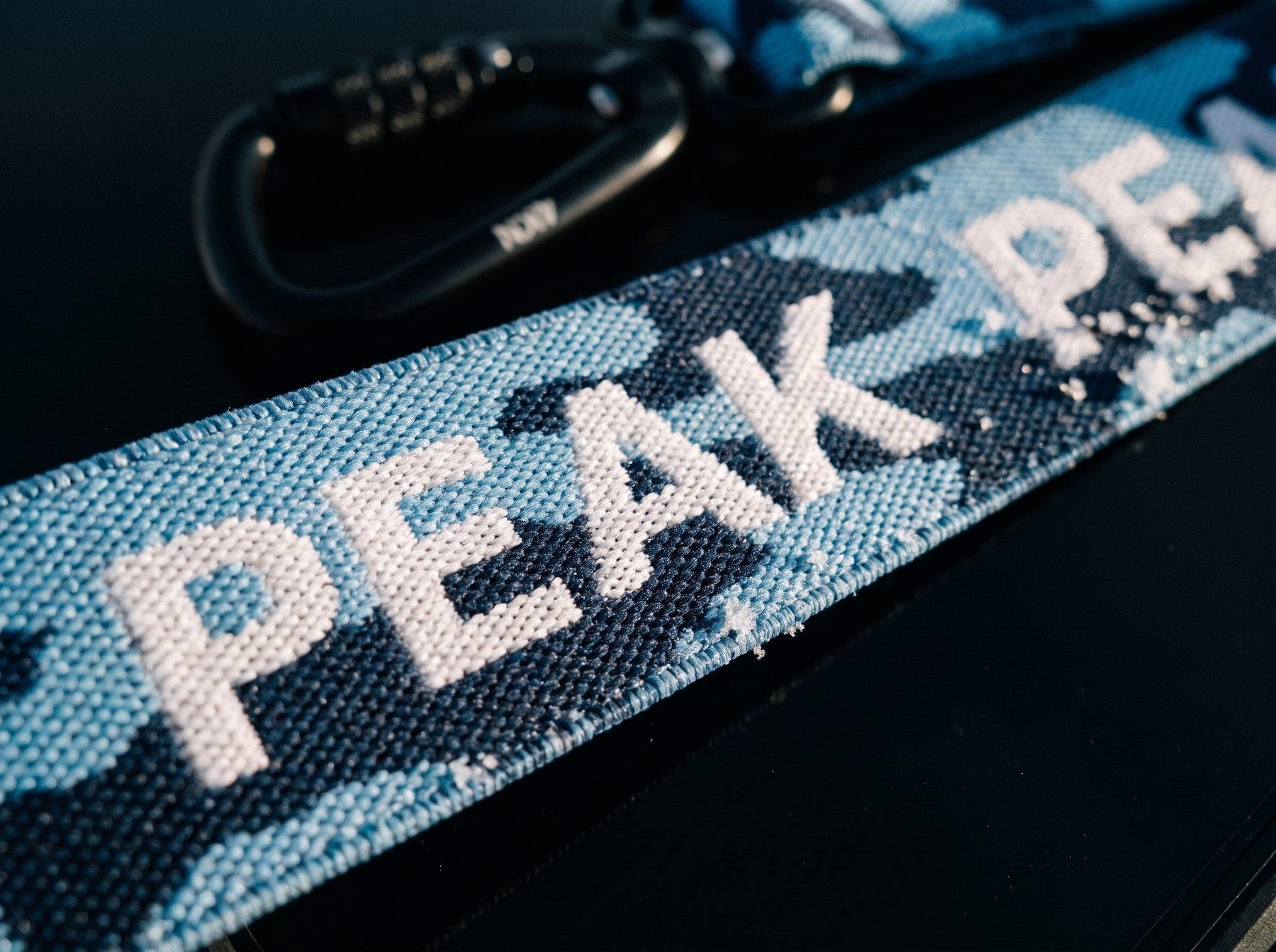 A Snow Joey band woven with a resort's own name in place of the Snow Joey wordmark